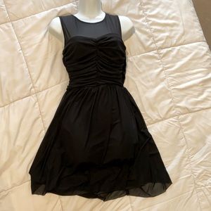 Beautiful black dress with sheer shoulders. Size medium